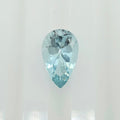 A single pear-cut light blue gemstone, centered on a plain white background.