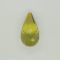 A faceted teardrop-shaped bead in a translucent yellow-green color, shown against a plain light gray background.