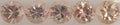 Five round brilliant-cut orangy pink to pinkish orange gemstones arranged in a row on a light gray background.