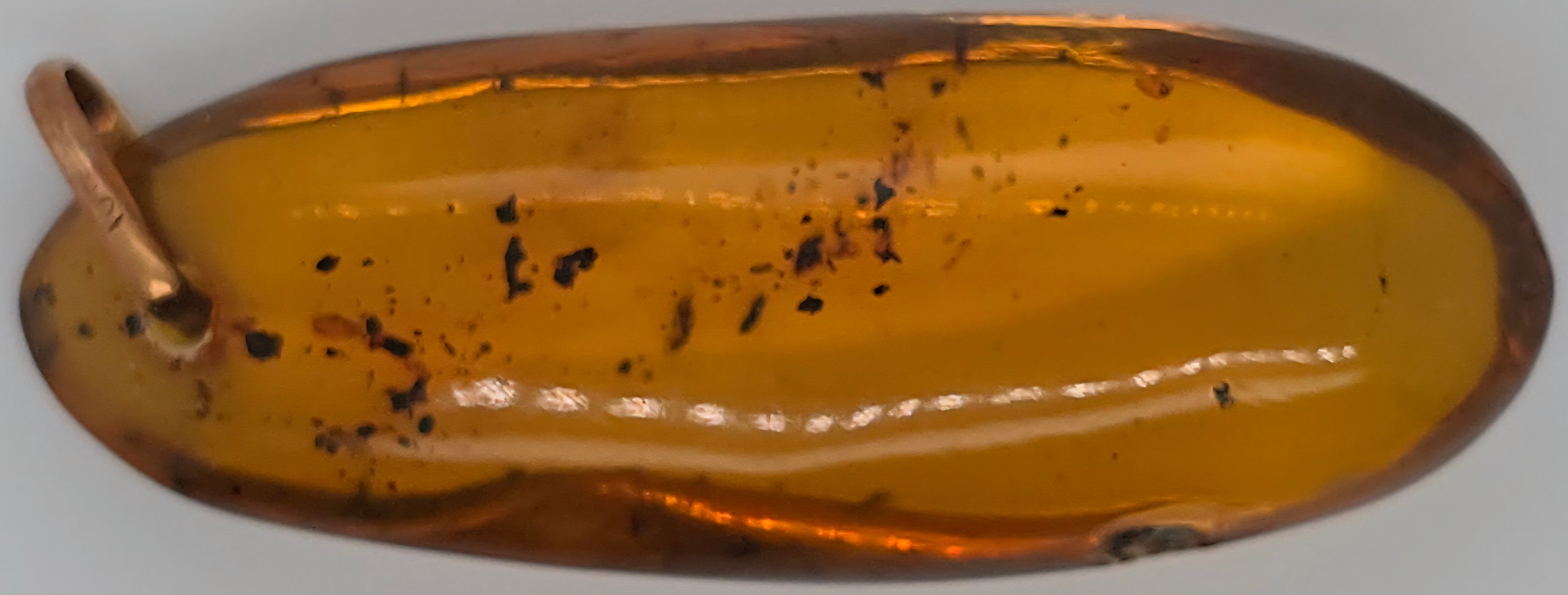 22.03ct Amber pendant with 10k gold bail