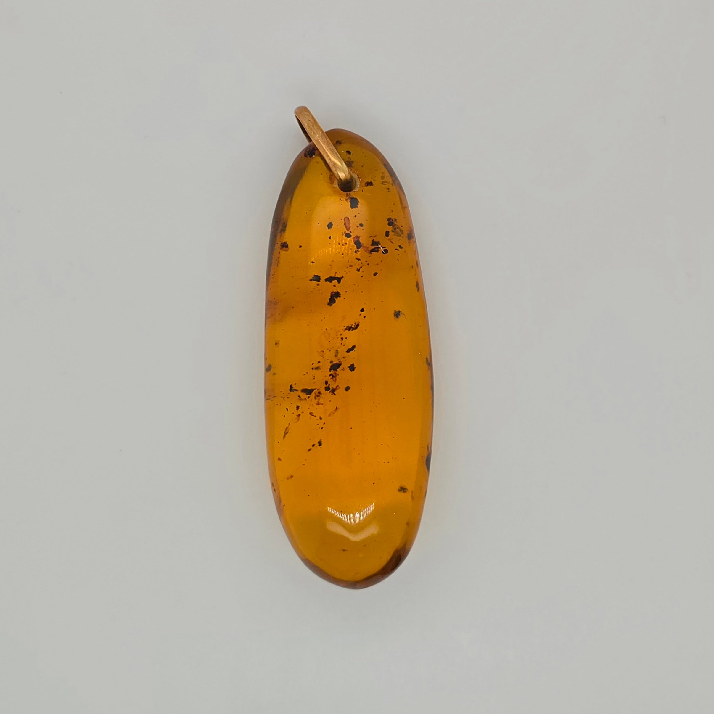 22.03ct Amber pendant with 10k gold bail