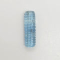 A light blue ribbed gemstone shown vertically on a plain white background.