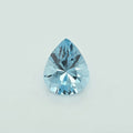 A light blue pear shaped faceted gemstone against a plain white background