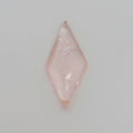 A diamond shaped pink gemstone cabochon with natural inclusions, displayed on a clean, light gray background.