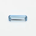 A light blue rectangular emerald-cut gemstone centered on a clean white background.