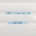 Nine baguette cut gemstones arranged in two horizontal rows on a plain white background