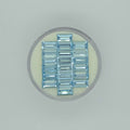 Twenty rectangle cut light blue faceted stones arranged in three columns on a circular off-white pad on a white background