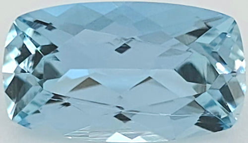 A light blue cushion-cut faceted gemstone, shown on a plain white background.