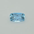 A light blue cushion-cut faceted gemstone centered on a plain light gray background.