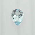A single pear-cut light blue gemstone with a faceted, reflective surface, centered against a plain light gray background.